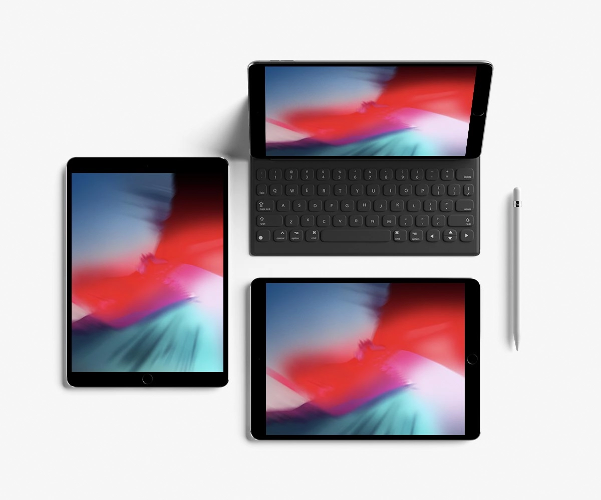 Image of tech devices with graphics that is the background for the header